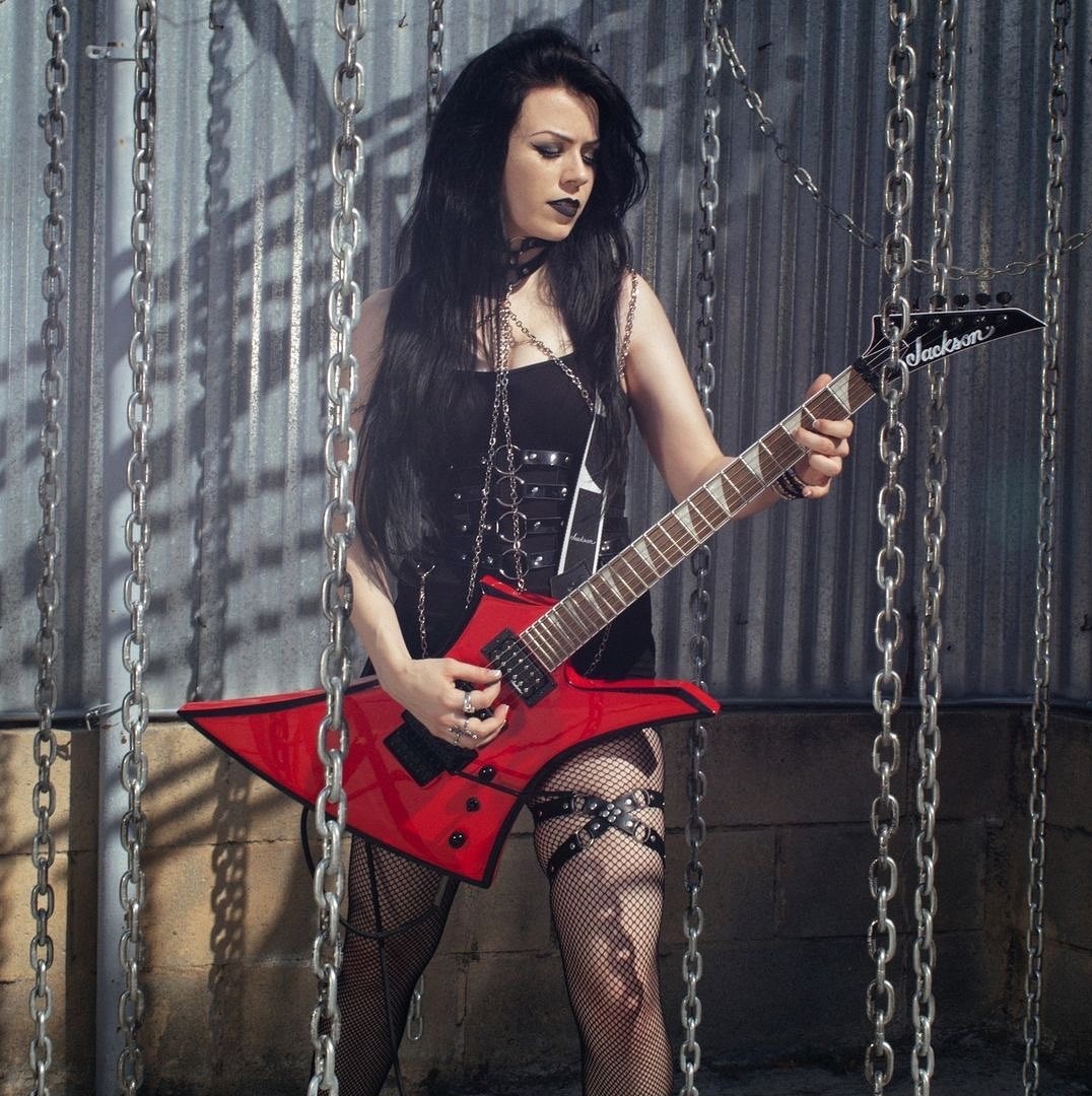 Emily Ruvidich on guitar